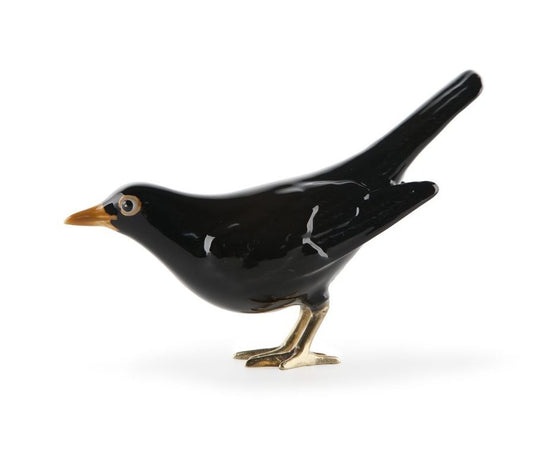 Ceramic pot with brass legs